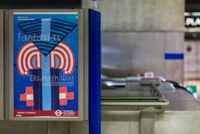 A poster of an abstract geometric artwork by artist Elisabeth Wild in a station environment.